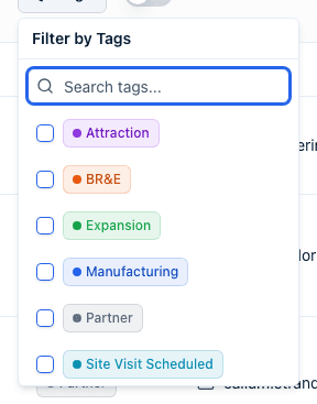The Tags filter popover open above the Contacts list, with a search box and a checklist of tags.